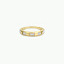 The White Opal Inset Baguette features five lab-grown white opals set evenly around an 18k gold plated band, shown on a plain white background.