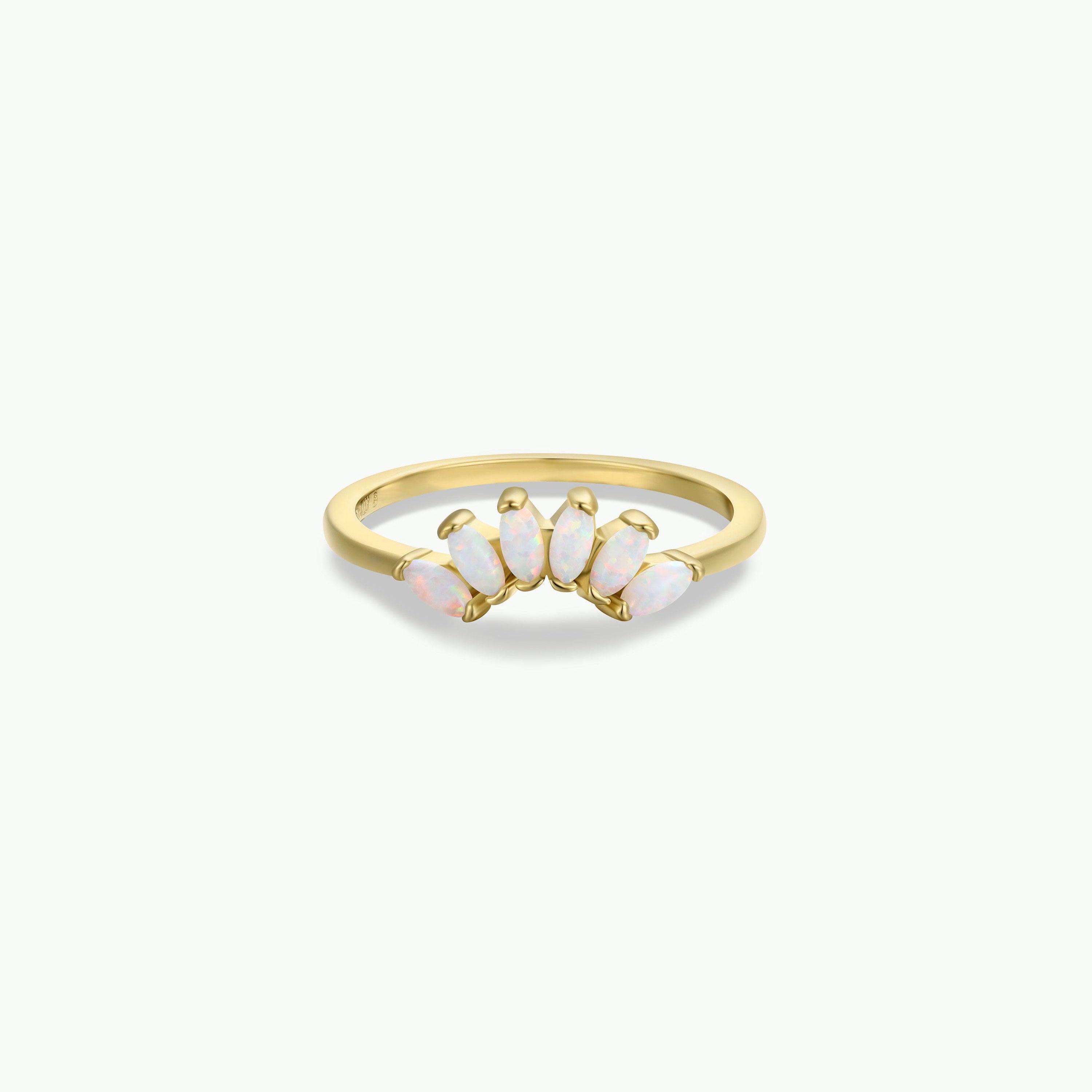 The Opal Crown Ring features five marquise-shaped white opals in a curved row, ideal for stacking. Shown against a plain white background.