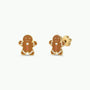 JaxKelly Gingerbread Man Enamel Flat Back Kids Earrings feature smiling gingerbread men with white icing accents and two red buttons on each. Crafted from surgical-grade stainless steel, these hypoallergenic earrings are ideal for sensitive ears. Presented on a plain white background.