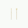 The Multi Pearl Drop features 18k gold plated hoop earrings with long, delicate chains adorned with evenly spaced small white pearls—a modern twist on classic pearl drop earrings, shown on a plain white background.