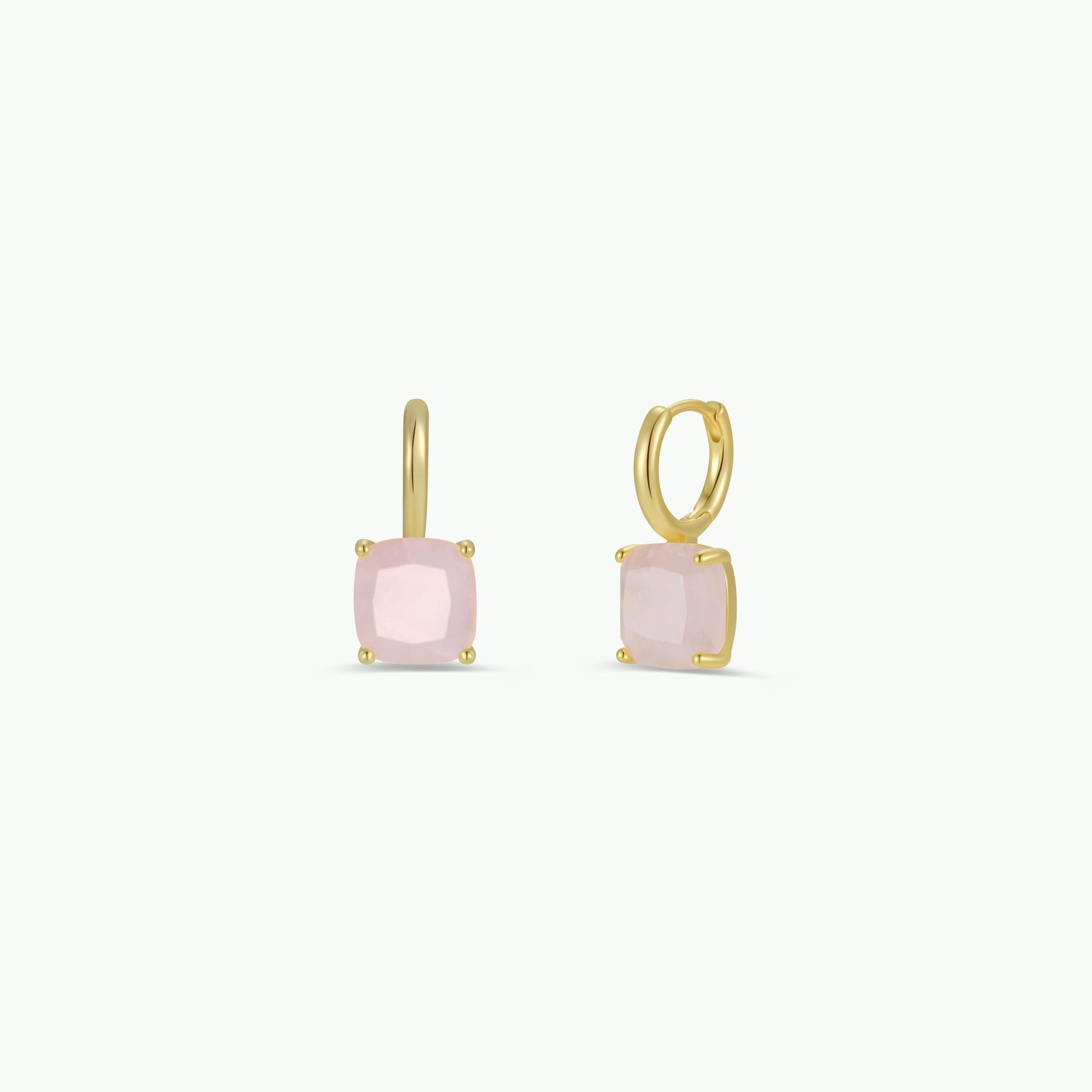 The Gemstone Mini Drop - Rose Quartz are gold plated hoop earrings with square, light pink rose quartz stones in four-prong settings, showcased against a plain white background.