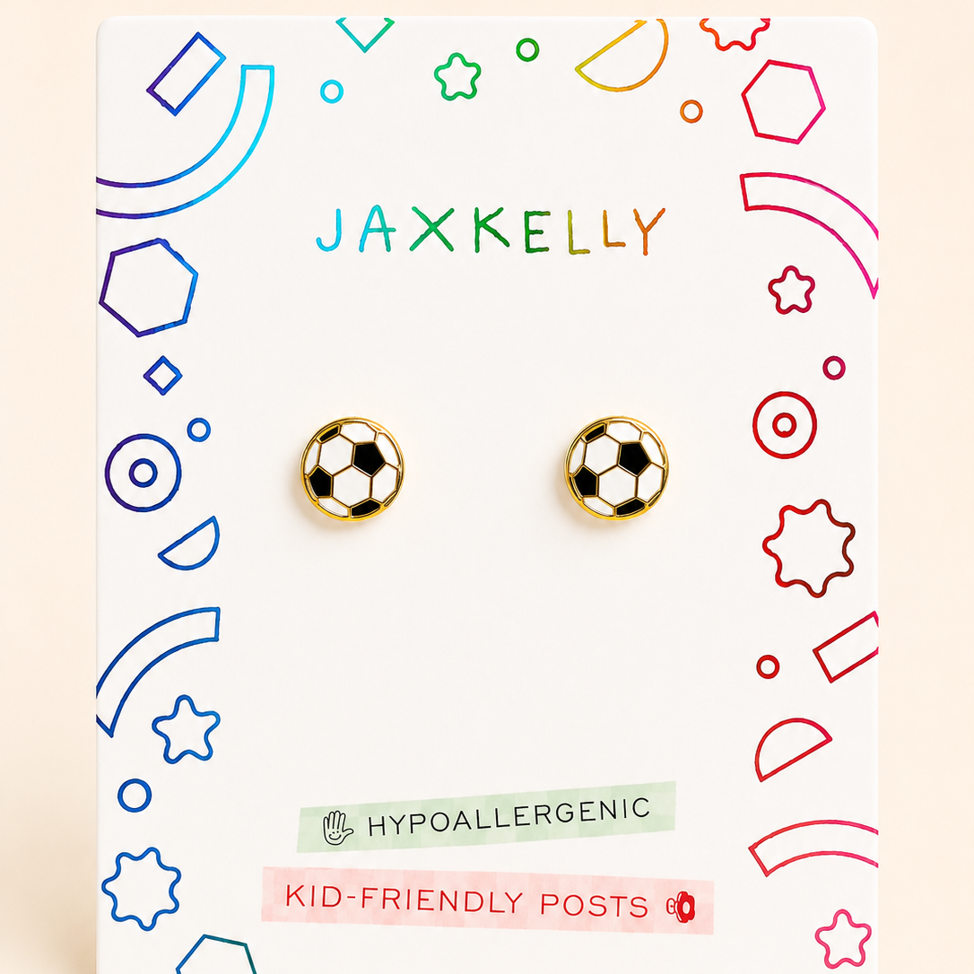 Pair of hypoallergenic Soccer Enamel Flat Back Kids Earrings shaped like soccer balls on a display card.