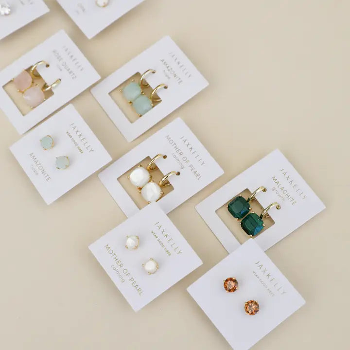 JaxKelly Round Amazonite Gemstone Gold Earrings, featuring minimalist style in pink, green, and white tones, are displayed on white branded cards.
