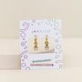 Cupcake Enamel Charm Hoop earrings on a white JaxKelly card with colorful geometric designs. The card notes hypoallergenic, kid-friendly posts—ideal for little ones with sensitive ears.