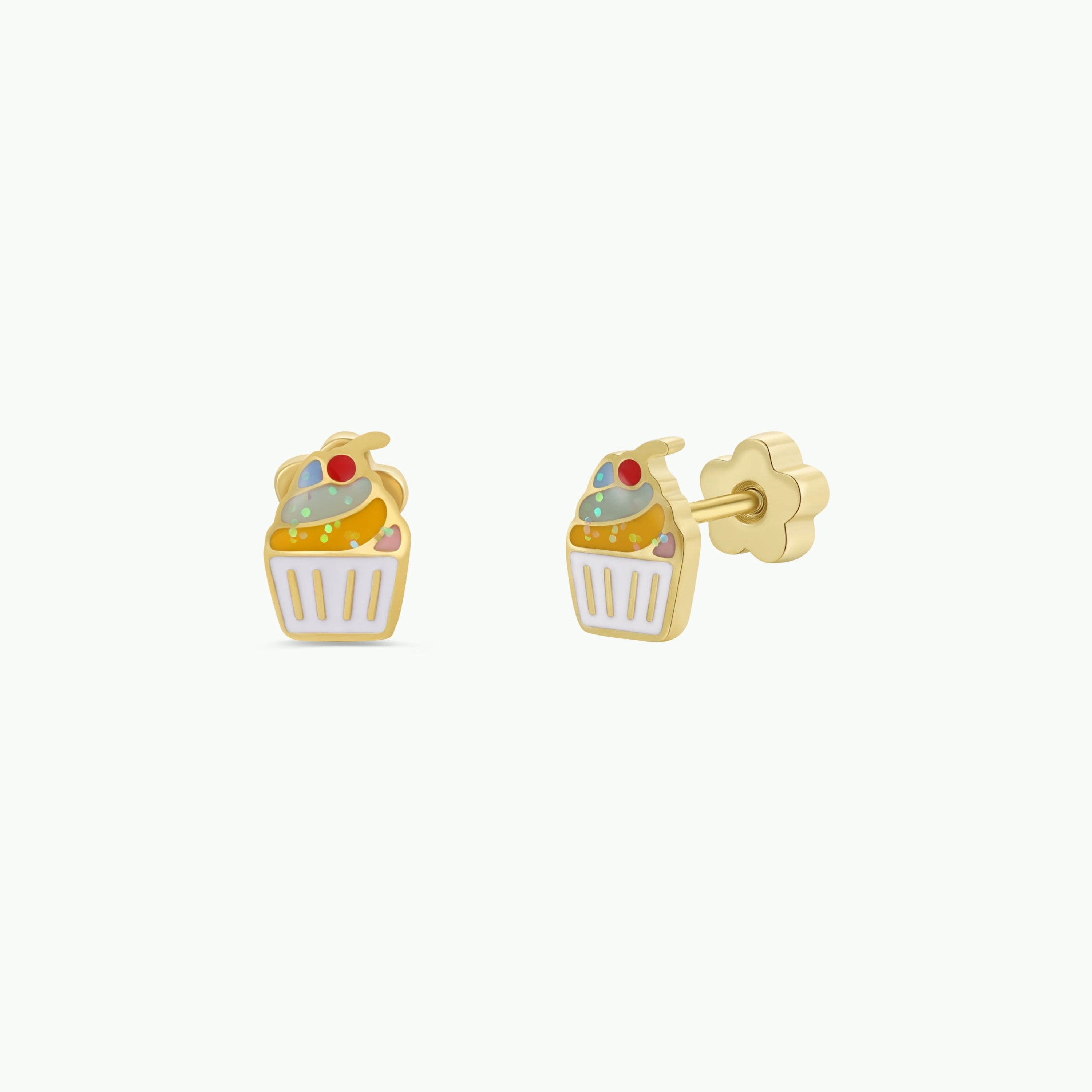 The Cupcake Enamel Flat Back Kids Earrings are cupcake-shaped hypoallergenic studs with a white base, yellow frosting, and red, blue, and green enamel details—perfect for kids and shown on a plain light background.