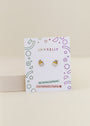 A pair of Cupcake Enamel Flat Back Kids Earrings on a JaxKelly card with colorful geometric designs. Hypoallergenic, these stud earrings are safe and comfortable for little ears.