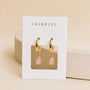 JaxKelly Teardrop Charm Hoop - Rose Quartz earrings featuring teardrop-shaped rose quartz charms on gold hoops, displayed on a white branded card.