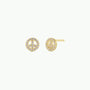 JaxKelly’s Pavé Peace Sign earrings feature 18k gold plating and sparkling CZ stones, shown against a plain light background.