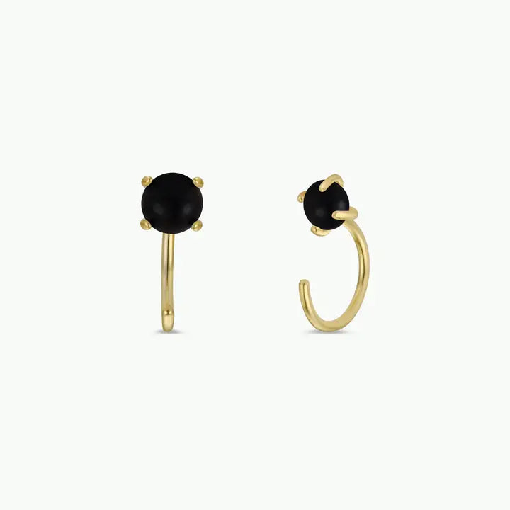 JaxKelly’s Obsidian Huggie earrings feature round obsidian gemstone studs in gold, shown from two angles on a plain white background.