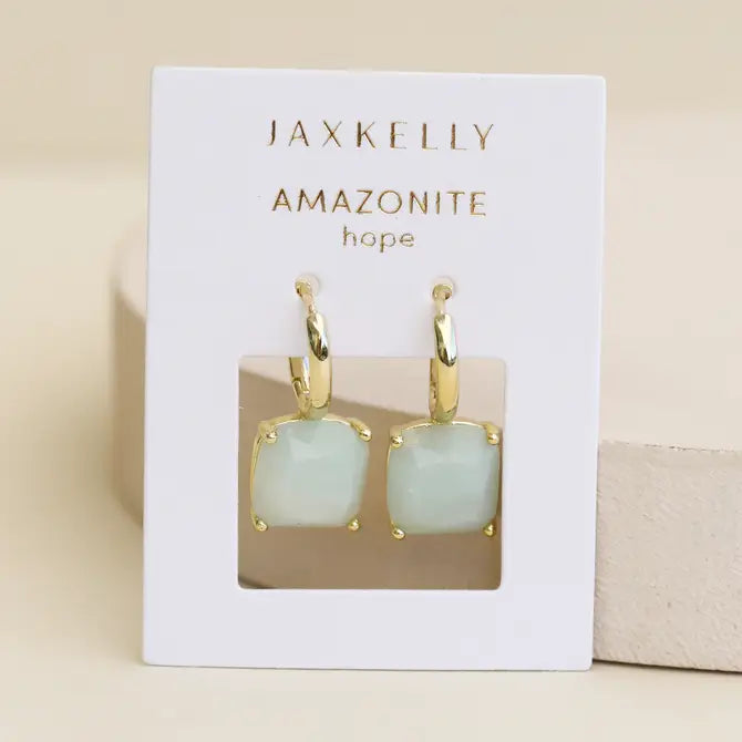 JaxKelly Gemstone Mini Drop - Amazonite earrings showcase pale blue-green cushion-cut amazonite stones in gold hoops, displayed on a white card labeled "AMAZONITE hope.