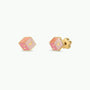 Pair of Pink Dice Enamel Flat Back Kids Earrings by JaxKelly, featuring hexagonal gold designs adorned with pink enamel, small yellow dots, and a yellow heart at the center. Displayed on a white background, these hypoallergenic earrings are perfect for sensitive ears, providing comfort and style all day long.