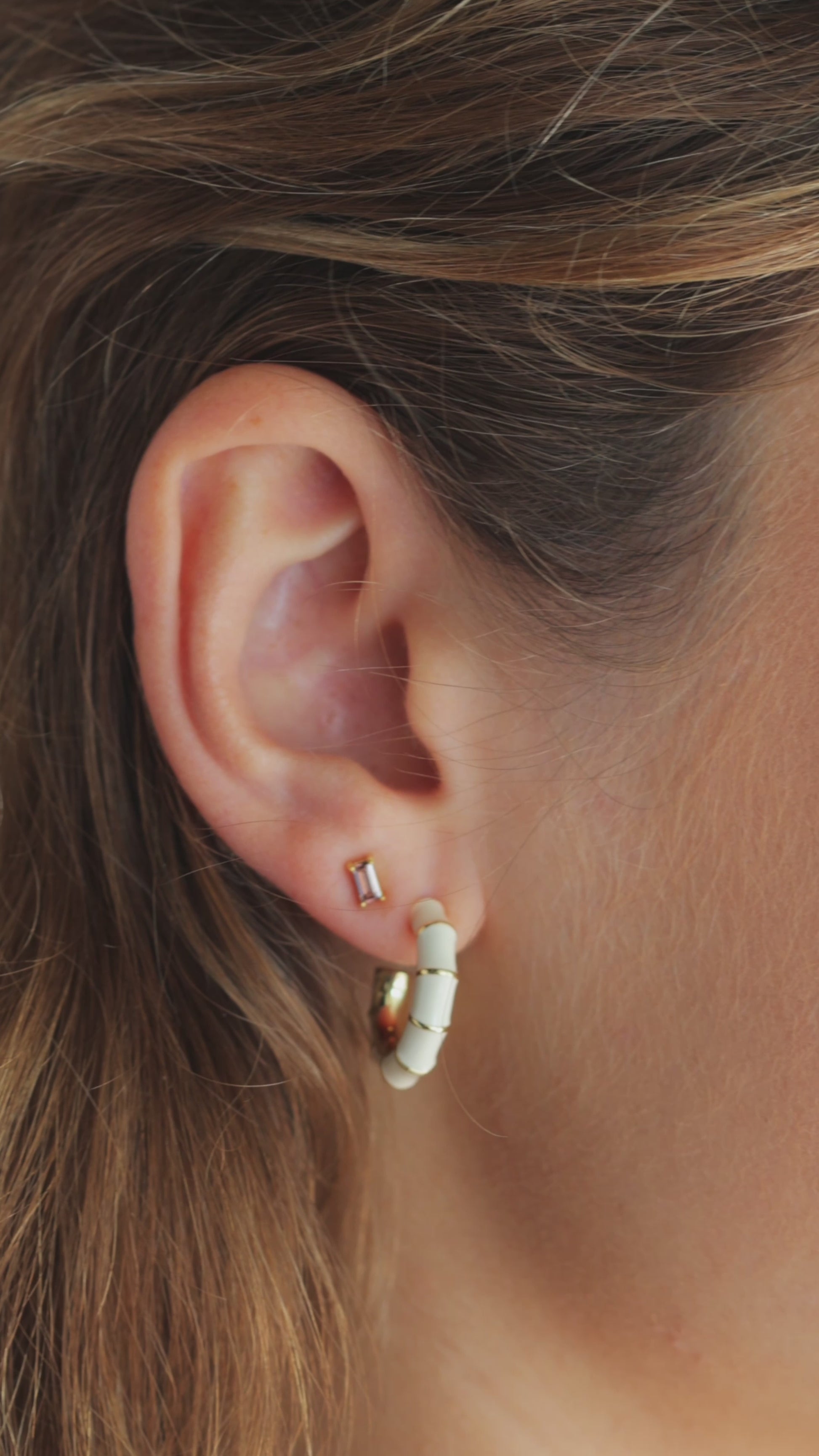 JaxKelly's Lilac Baguette Studs and other JaxKelly earring styles on a model.