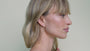 JaxKelly's Pave Link Drop Earrings on a model.