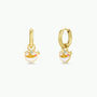 The Ramen Enamel Charm Hoop earrings are gold hoops with hypoallergenic posts, each adorned with a colorful ramen bowl charm featuring noodles, eggs, and chopsticks—perfect kids' earrings for sensitive ears against a white background.