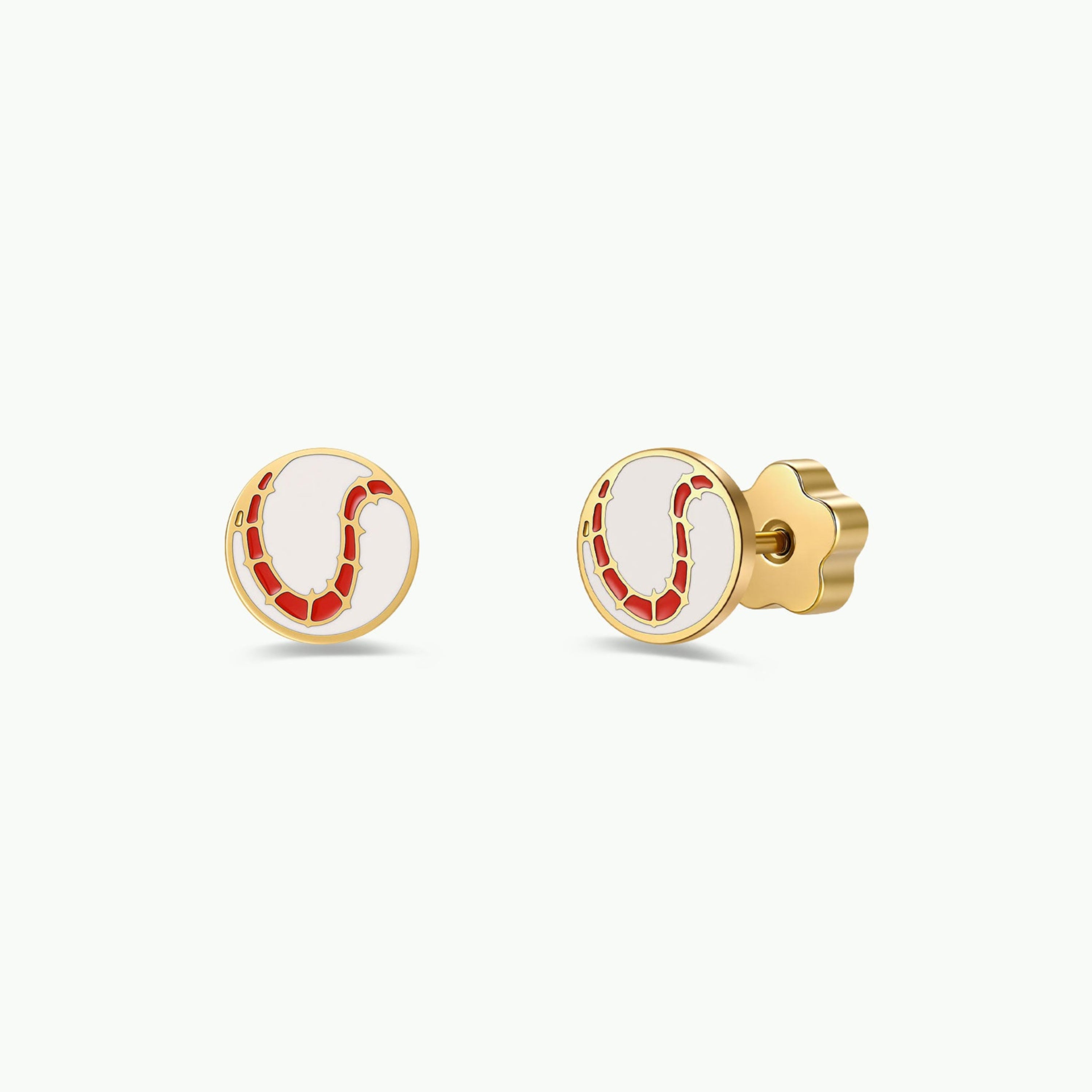 Adorned with a playful red enamel swirl on a white enamel background, the JaxKelly Softball Enamel Flat Back Kids Earrings are round gold-toned studs crafted from surgical-grade stainless steel. These hypoallergenic earrings are gentle on sensitive ears and ideal for everyday wear.