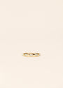 The White Opal Inset Baguette is an 18k gold plated ring with a row of lab-grown white opal baguettes set evenly around the band, shown on a plain light beige background.