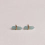 A pair of Amazonite Mineral Point - Hope earrings, showcasing pale blue double-pointed crystals wrapped in thin gold wire, displayed on a plain white background.