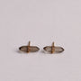 A pair of Smoky Quartz Mineral Point - Protection stud earrings with double-pointed clear smoky quartz crystals wrapped in 18k gold plated wire on sterling silver posts, shown on a plain white background.